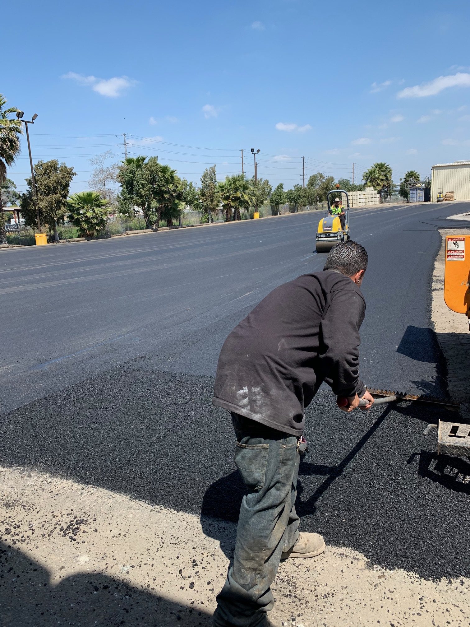 Freshly laid blacktop asphalt paving for a smooth residential surface